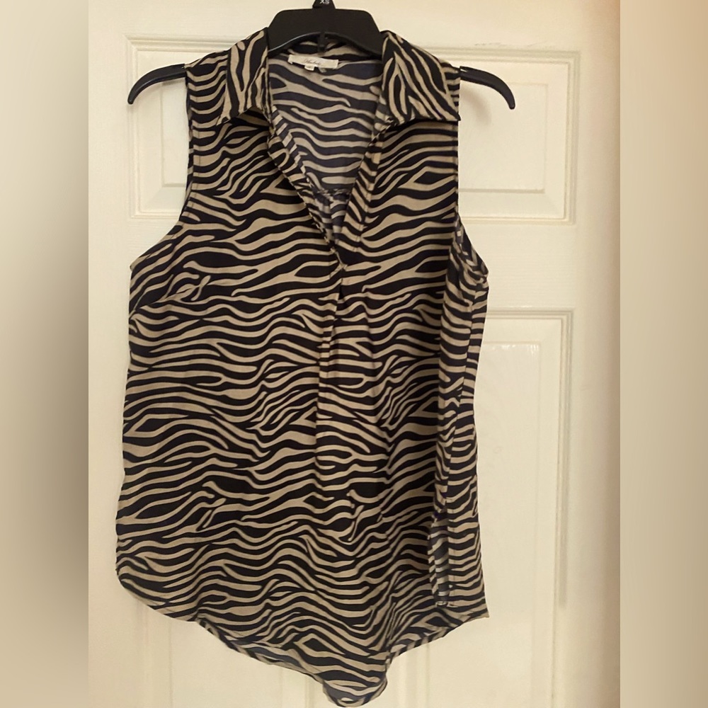 Collared tank style blouse.